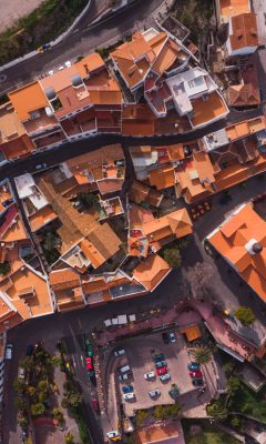 Aerial view of small town of Tejeda in valley of rocky mountains in sunlight, Gran Canaria